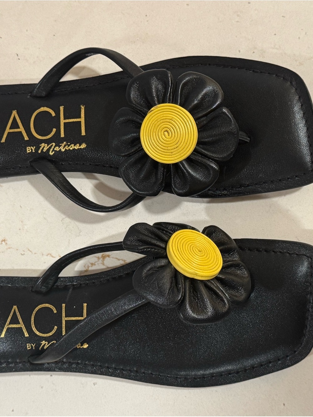 Matisse Black Flip Flop Sandals with Yellow Flower Center